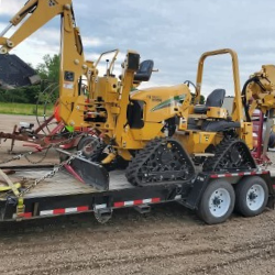 Reliable underground cable and fiber installation using a mini trencher on a trailer